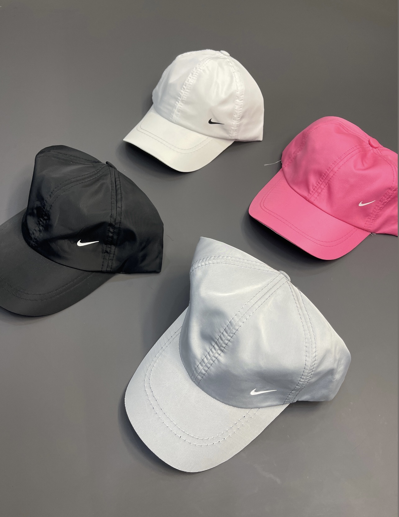 کلاه اسپرت پشت چسبی جنس شمعی مدل نایک Nike کد 0312